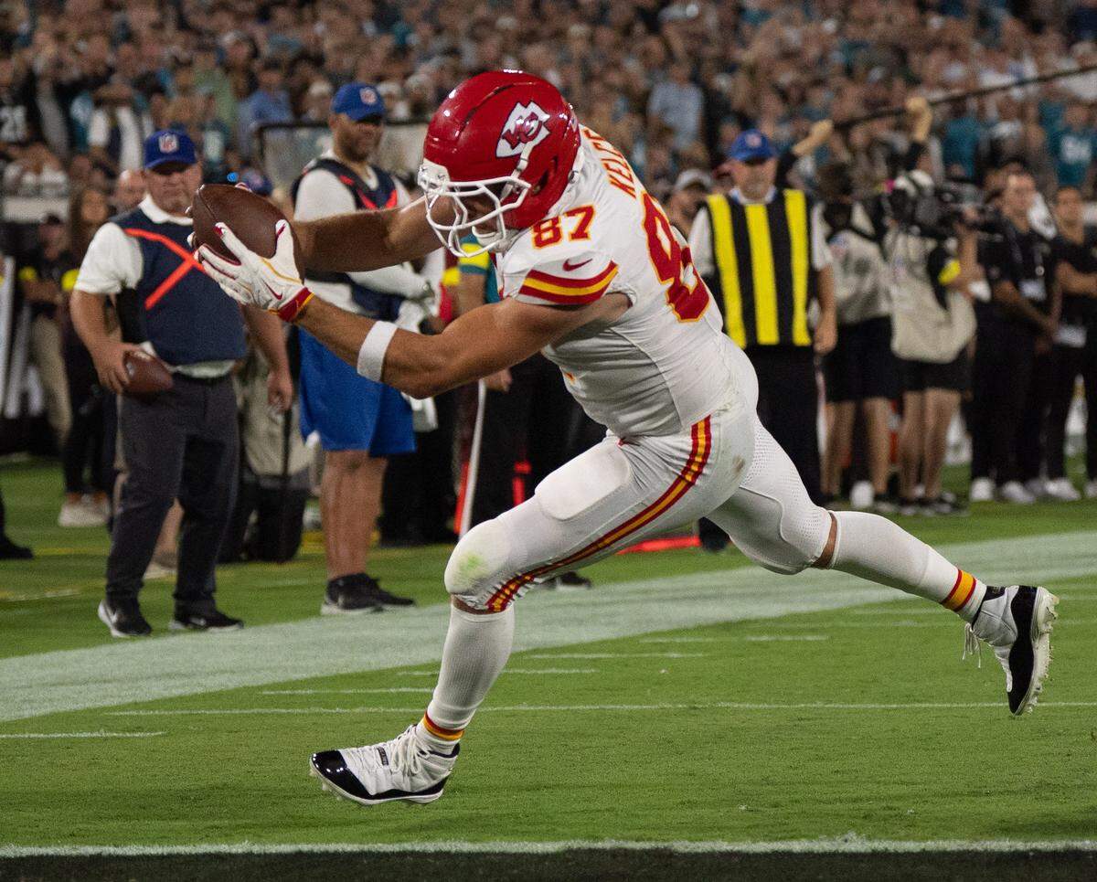 Kansas City Chiefs tight end Travis Kelce scores a touchdown during an NFL game against the Jaguars at EverBank Stadium in Jacksonville, Florida, on Monday, Oct. 6, 2025.