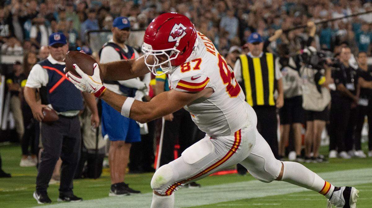 Kansas City Chiefs tight end Travis Kelce scores a touchdown during an NFL game against the Jaguars at EverBank Stadium in Jacksonville, Florida, on Monday, Oct. 6, 2025.