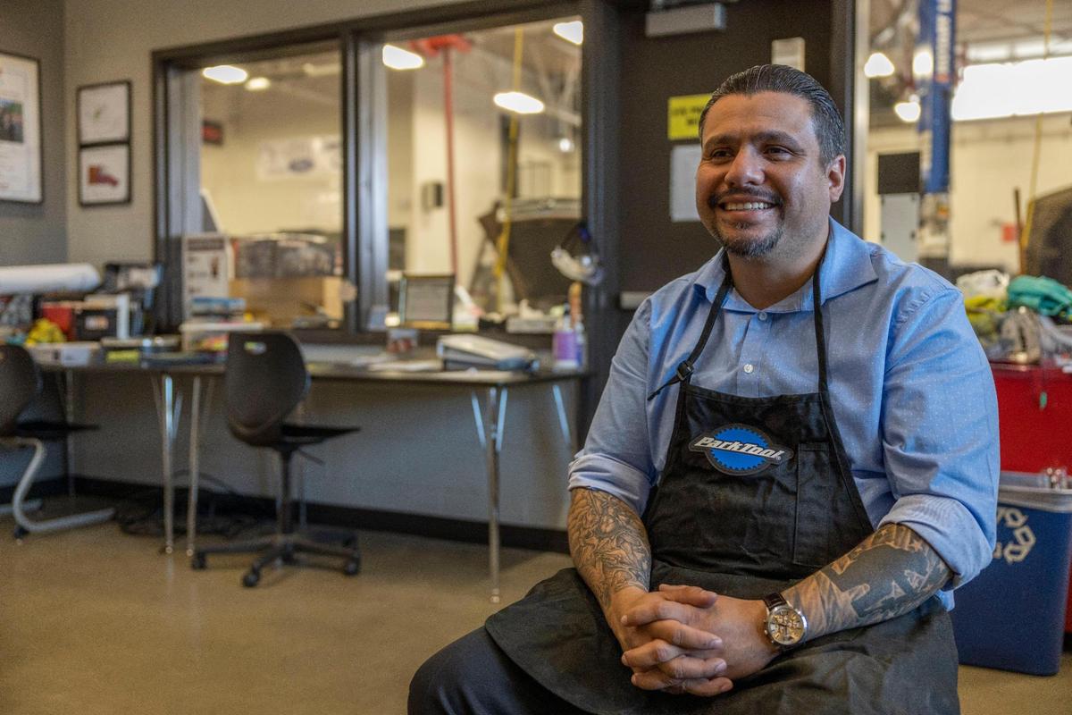Erik Erazo, a California-bred mechanic, worked his way up from being a security officer at Olathe North High School to now serving as a top administrator in the district, as executive director of diversity and engagement. His programs have helped dozens of Hispanic and at-risk students graduate.