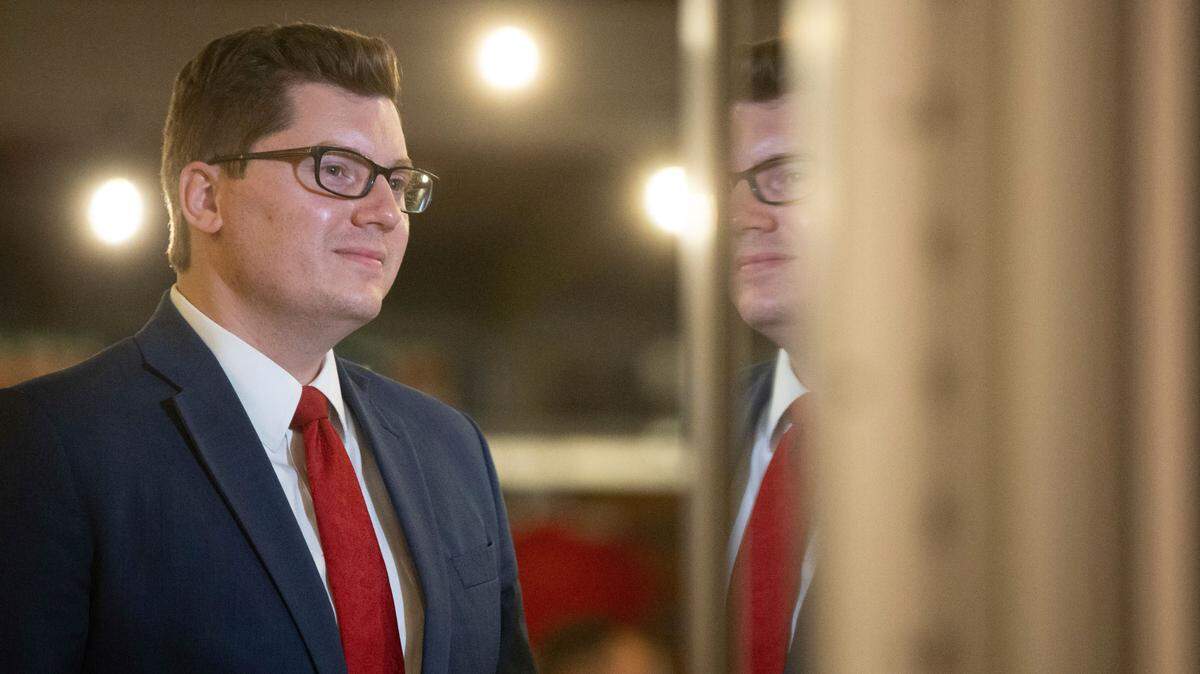 Kansas treasurer Jake LaTurner takes a moment before speaking to reporters after winning the Republican primary in Kansas’ 2nd Congressional District, Tuesday, Aug. 4, 2020, in Topeka, Kan.