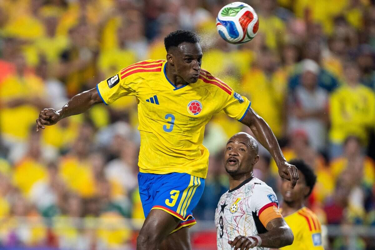 Colombia defender Jhon Lucumí (3) performs a header in a 2026 FIFA World Cup Round of 32 soccer match at Kansas City (Arrowhead) Stadium in Kansas City on Friday, July 3, 2026.