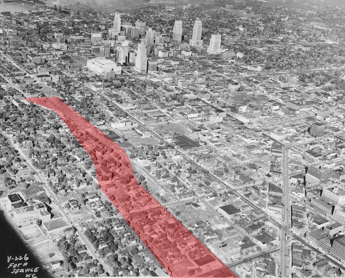 By the time this aerial view of the West Side neighborhood was taken, the route for Southwest Trafficway (highlighted in red) was already being cleared of homes and businesses.