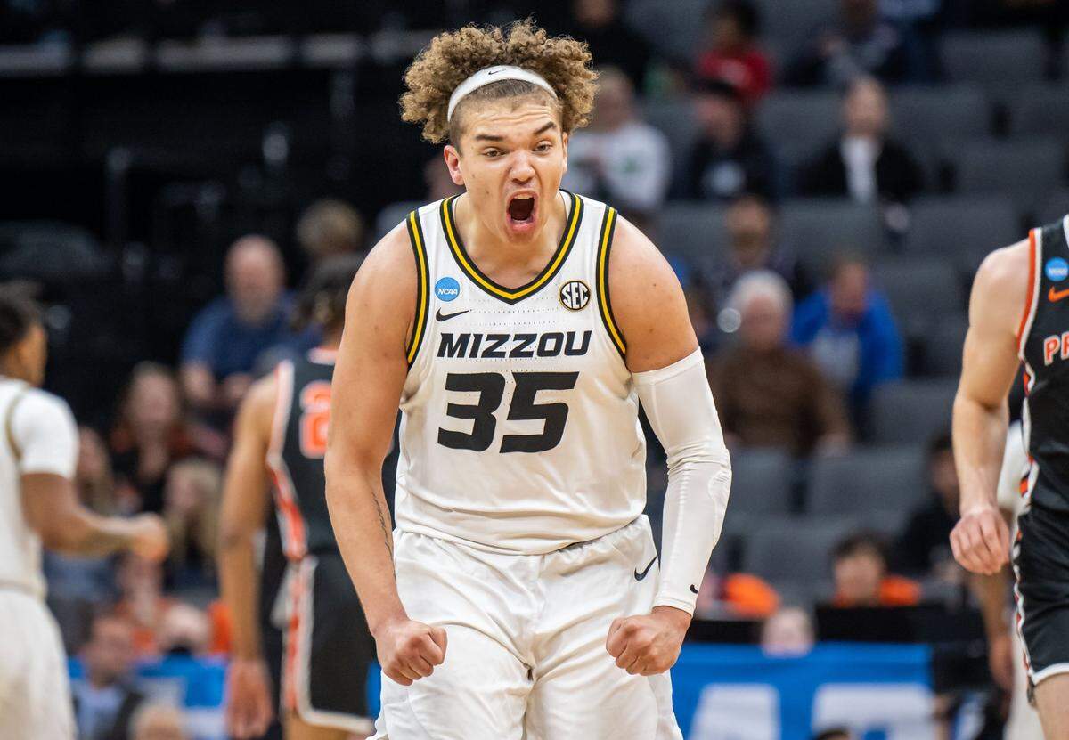 Missouri Tigers forward Noah Carter (35) yells out after scoring against the Princeton Tigers during the first half of their NCAA Tournament game at Golden 1 Center on Saturday, March 18, 2023, in Sacramento.