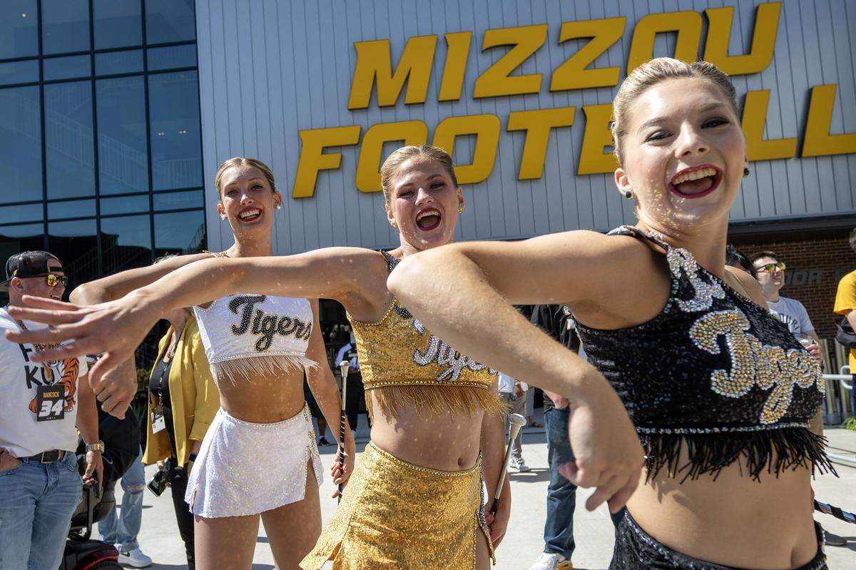 Missouri baton twirlers perform during a pep rally outside Faurot Field at Memorial Stadium before the Tigers' game against the Kansas Jayhawks on Saturday, Sept. 6, in Columbia.