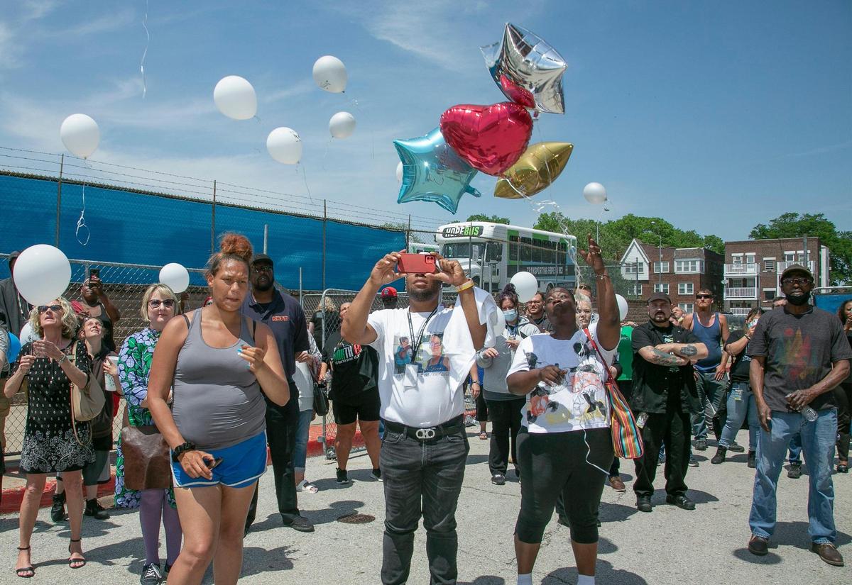 Friends and family of Marcia Boring, 52, and Eugene Shaw, 50, released balloons during a memorial Friday at Hope Faith shelter in Kansas City. Both Boring and Shaw were found dead May 6 in a wooded area near 2nd and Lydia Avenue.