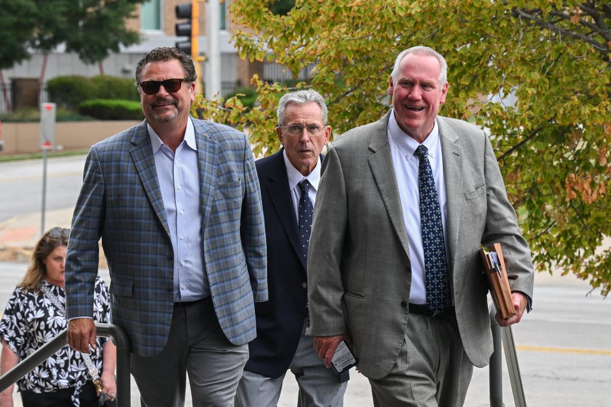 Lawrence McManamon, center, a former international vice president of the Boilermakers union, enters the Robert J. Dole Federal Courthouse in Kansas City, Kansas, on August 30, 2024. Four former union officers made their first appearances in federal court after being indicted Aug. 21 on embezzlement and other felony charges.