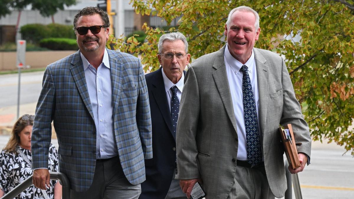 Lawrence McManamon, center, a former international vice president of the Boilermakers union, enters the Robert J. Dole Federal Courthouse in Kansas City, Kansas, on August 30, 2024. Four former union officers made their first appearances in federal court after being indicted Aug. 21 on embezzlement and other felony charges.