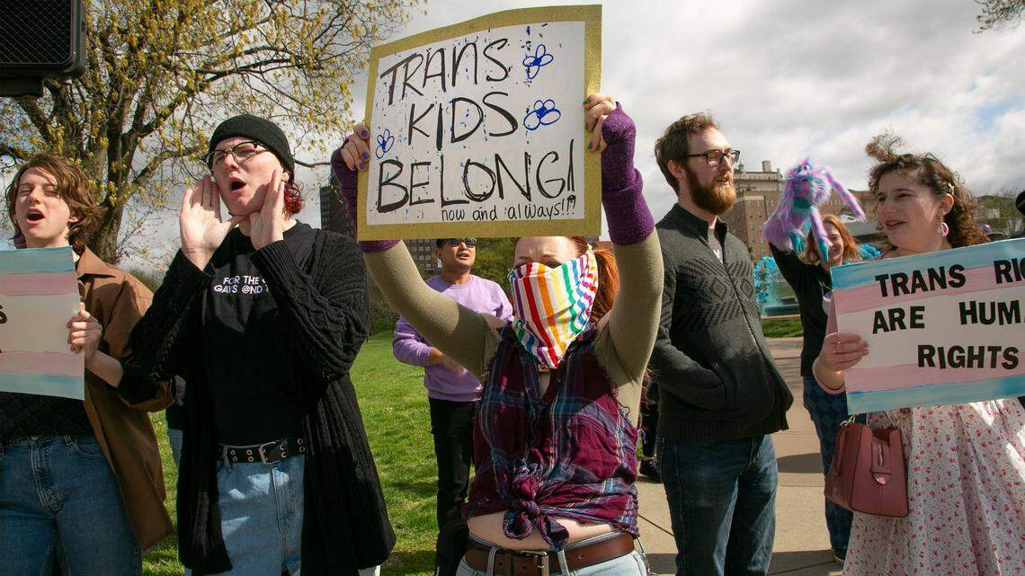 Andi McMillan (center) and other advocates for transgender rights protested Missouri Attorney General Andrew Bailey’s previous restrictions on trans health care.