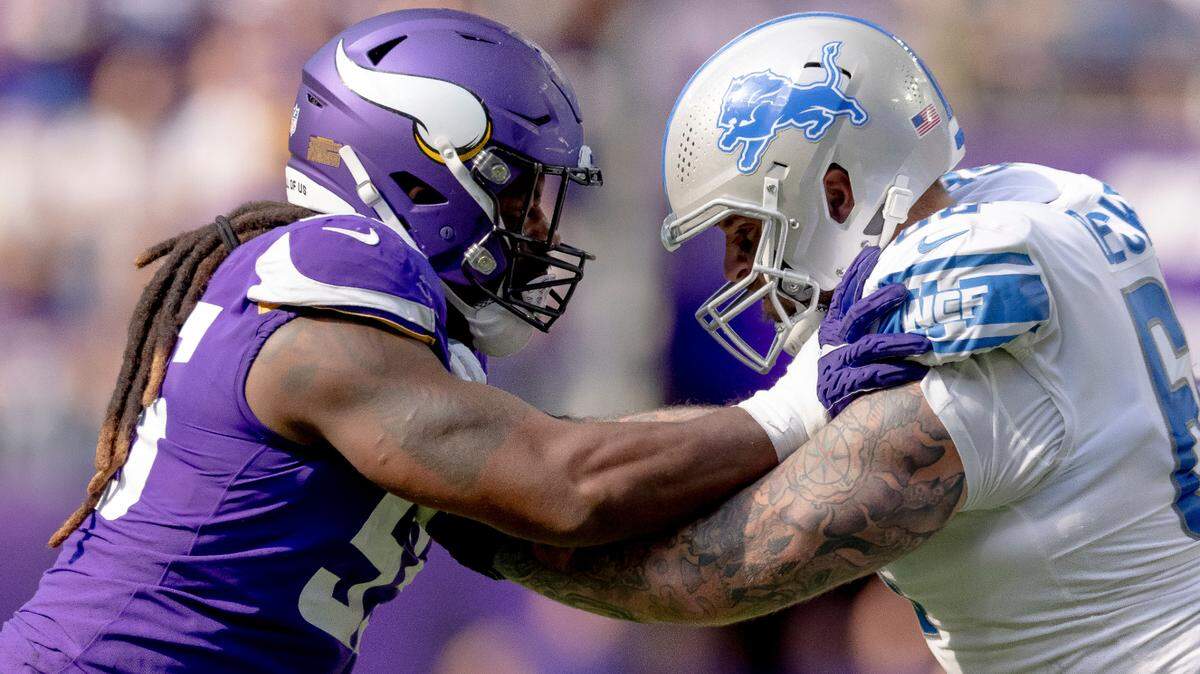 Minnesota Vikings linebacker Za’Darius Smith (55) in action against Detroit Lions offensive tackle Taylor Decker (68) during the second half of an NFL football game, Sunday, Sept. 25, 2022 in Minneapolis. (AP Photo/Stacy Bengs)