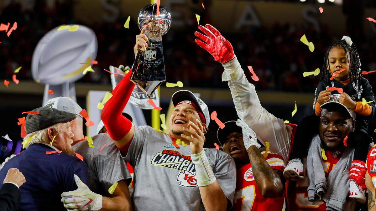 Kansas City Chiefs quarterback Patrick Mahomes holds the Vince Lombardi Trophy after the Kansas City Chiefs won Super Bowl LIV against the San Francisco 49ers at Hard Rock Stadium on Sunday in Miami Gardens, Florida.