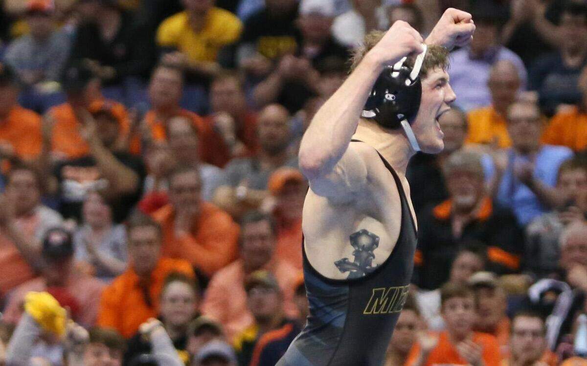 Missouri's Drake Houdashelt reacts after defeating Edinboro's David Habat in their 149-pound match during the NCAA wrestling championships Saturday, March 21, 2015, in St. Louis. 