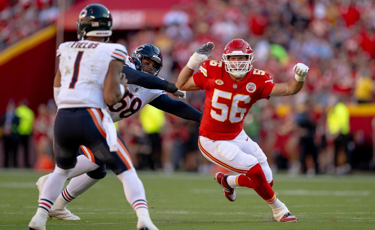Kansas City Chiefs defensive end George Karlaftis (56) pressures Chicago Bears quarterback Justin Fields (1) during an NFL football game at GEHA Field at Arrowhead Stadium on Sunday, Sept. 24, 2023, in Kansas City.