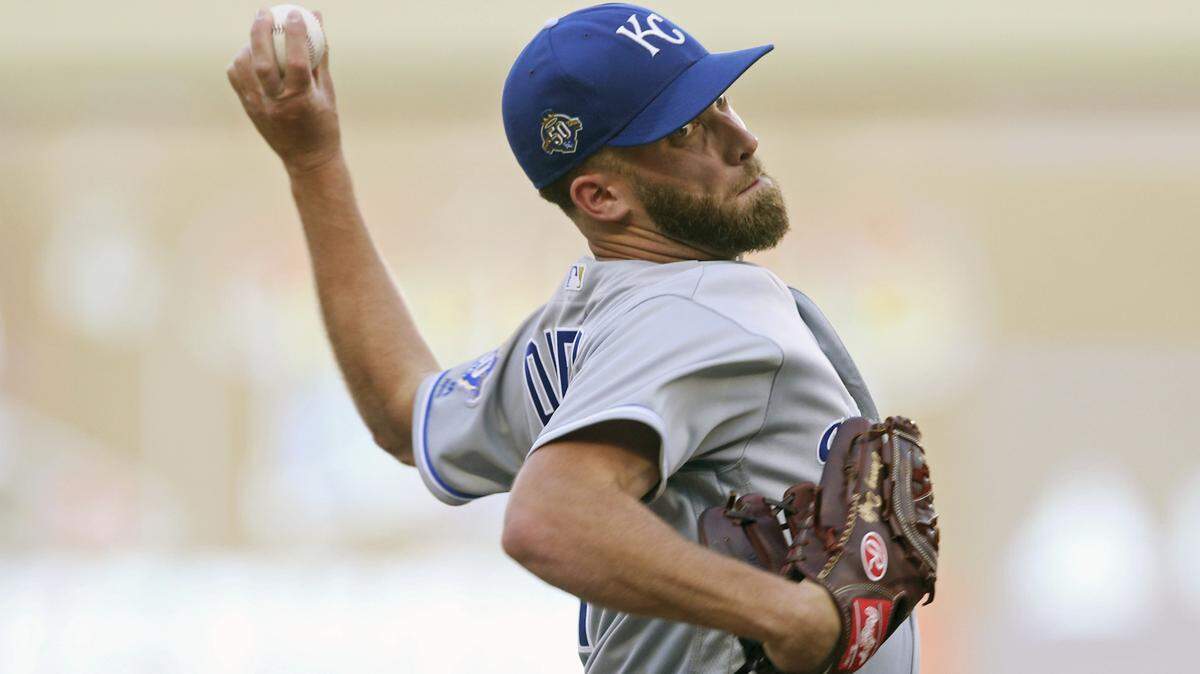 Kansas City Royals pitcher Danny Duffy throws against the Minnesota Twins in the first inning of a baseball game Monday, July 9, 2018, in Minneapolis.