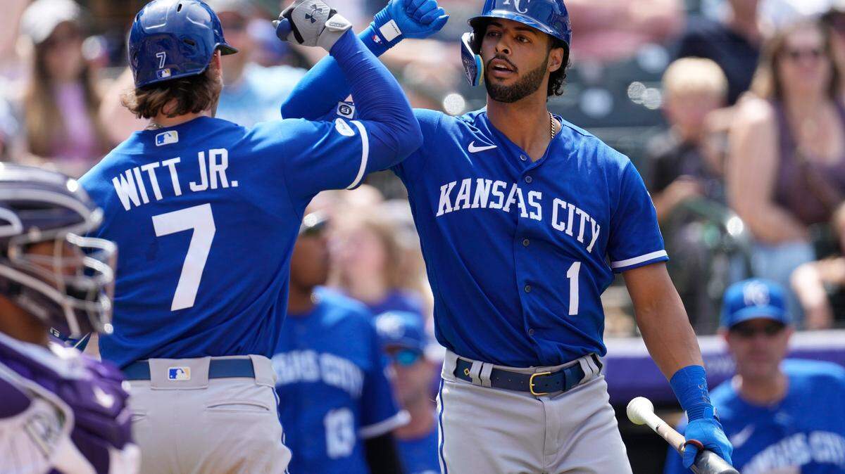 MJ Melendez, right, congratulates Royals teammate Bobby Witt Jr. after the latter’s solo home run off Colorado Rockies relief pitcher Jhoulys Chacin during a May game at Denver.