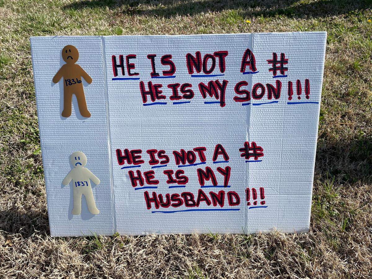 Family members of prisoners at the federal facility in Leavenworth organized a protest to voice their concerns about the prison’s conditions.