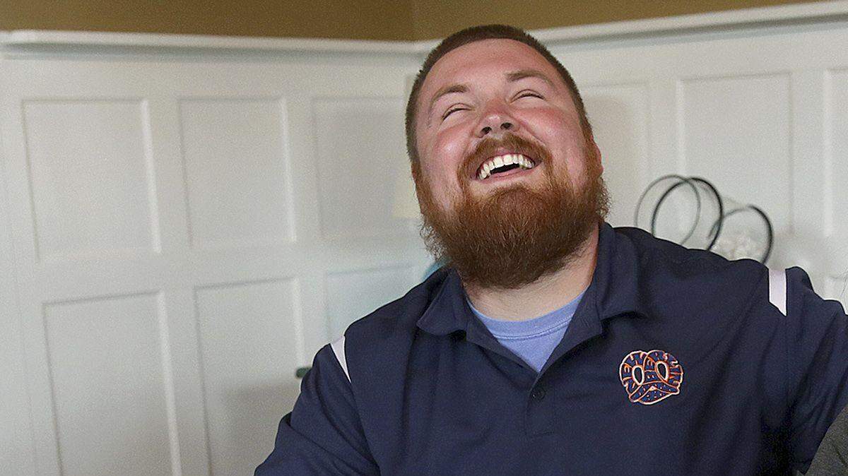 Joel Burger and Ashley King reacted Monday at King’s home in New Berlin, Ill., after learning from a New York public relations firm that Burger King had offered to pay the expenses and provide gifts for their wedding.