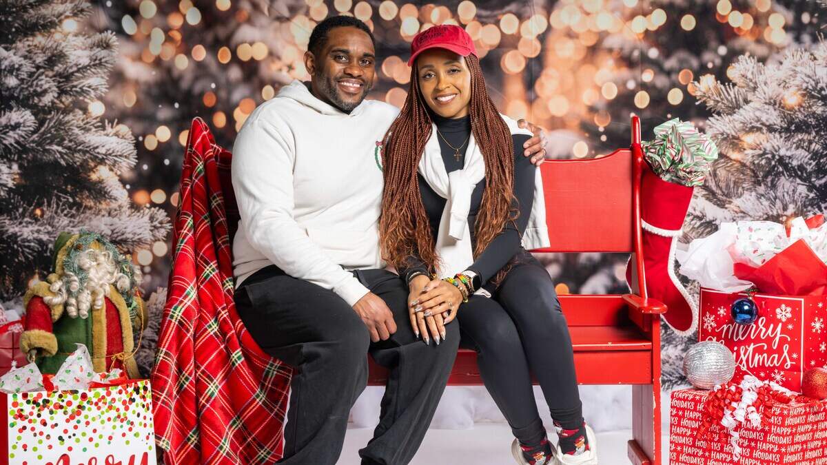 Dennis Powell, who runs the newly labeled TSOS Do Good Foundation, and his wife, Iman Powell, had their portrait taken at their annual Soul of Santa holiday breakfast for families in need.
