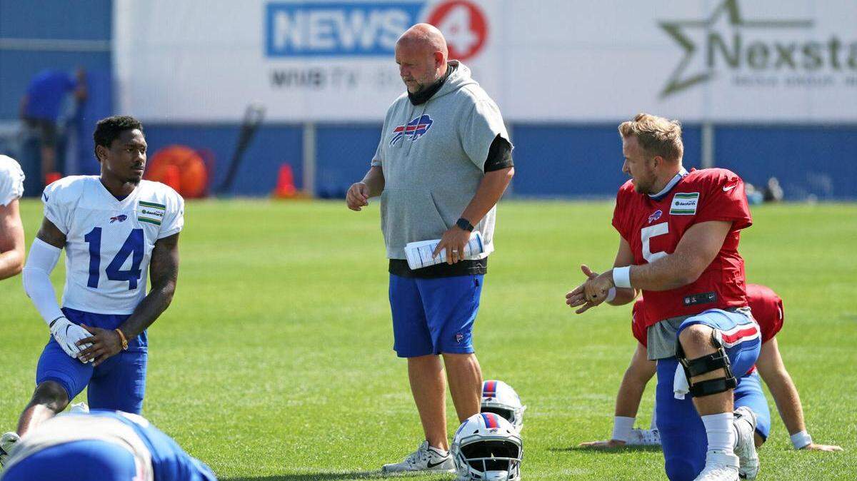 Bills assistant coach Brian Daboll works with players during Buffalo’s most recent training camp. He’s viewed as a key piece of the team’s future.