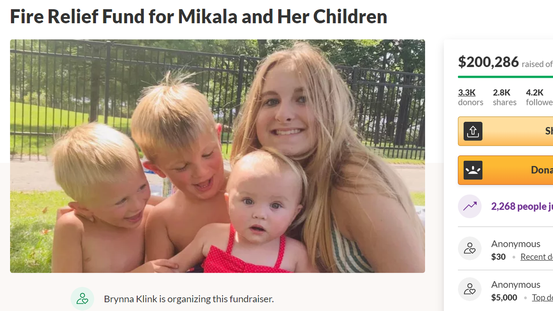 A Chelsea, Michigan, mother suffered serious burns to much of her body after rescuing her children from a house fire, firefighters said.
