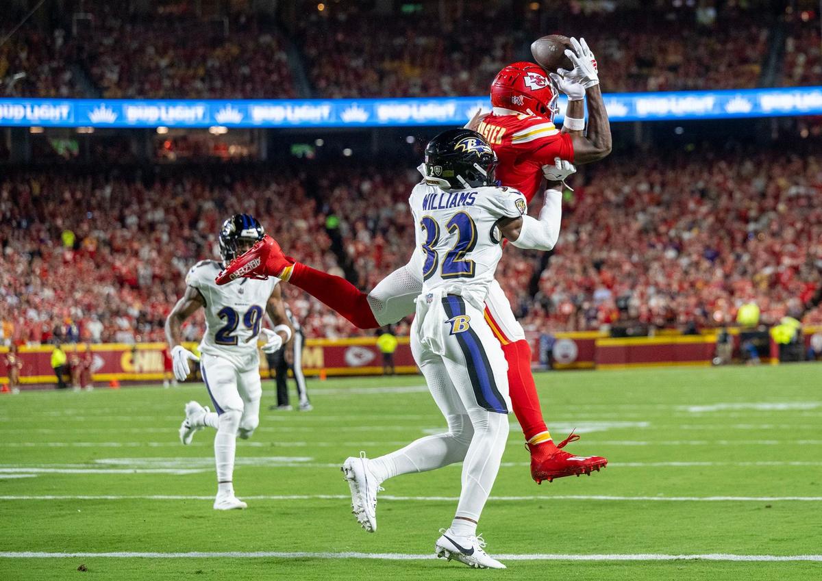 Kansas City Chiefs wide receiver JuJu Smith-Schuster (9) barely misses a pass over Baltimore Ravens safety Marcus Williams (32) in the first half on Thursday, Sept. 5, 2024, at GEHA Field at Arrowhead Stadium.