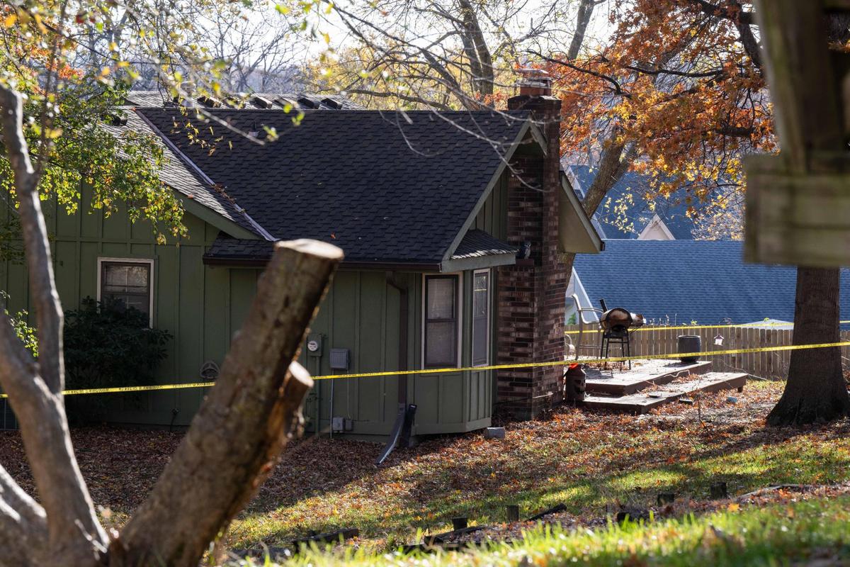 A house is taped off where a FBI agent-involved shooting took place on Monday, Nov. 25, 2024 in Kansas City.