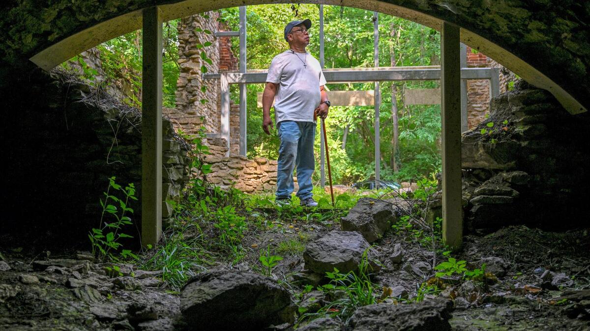 During a visit to the Quindaro Ruins, Anthony Hope of Concerned Citizens for Old Quindaro Museum, views the ruins of an old brew house, including a brew cave, on Thursday, June 8, 2023, in Kansas City, Kansas. Hope’s great, great, grandfather, Robert Monroe, was an enslaved person who escaped Clay County, Missouri, by walking across the frozen Missouri River to the Quindaro township in 1856. Hope is working to save and share the legacy and history of the Quindaro area.