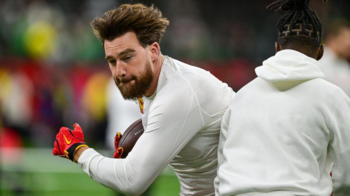Kansas City Chiefs tight end Travis Kelce warms up on the field before the start of Super Bowl LIX on Sunday, Feb. 9, 2025, in New Orleans.