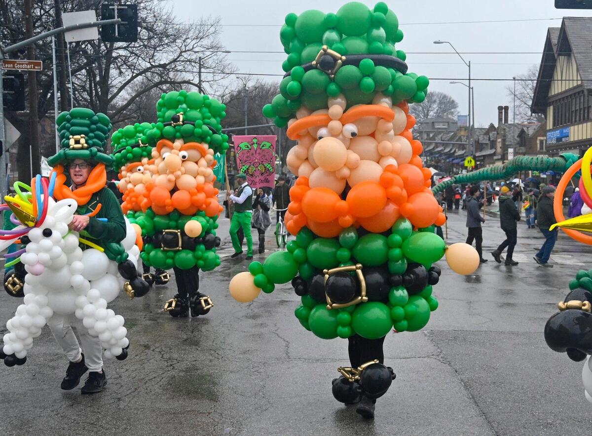 Balloon creations from Up, Up & Away! Kansas City Balloons walked in the 2023 Brookside St. Patrick’s Day Warm-Up Parade on Saturday March 11, 2023 in Kansas City.