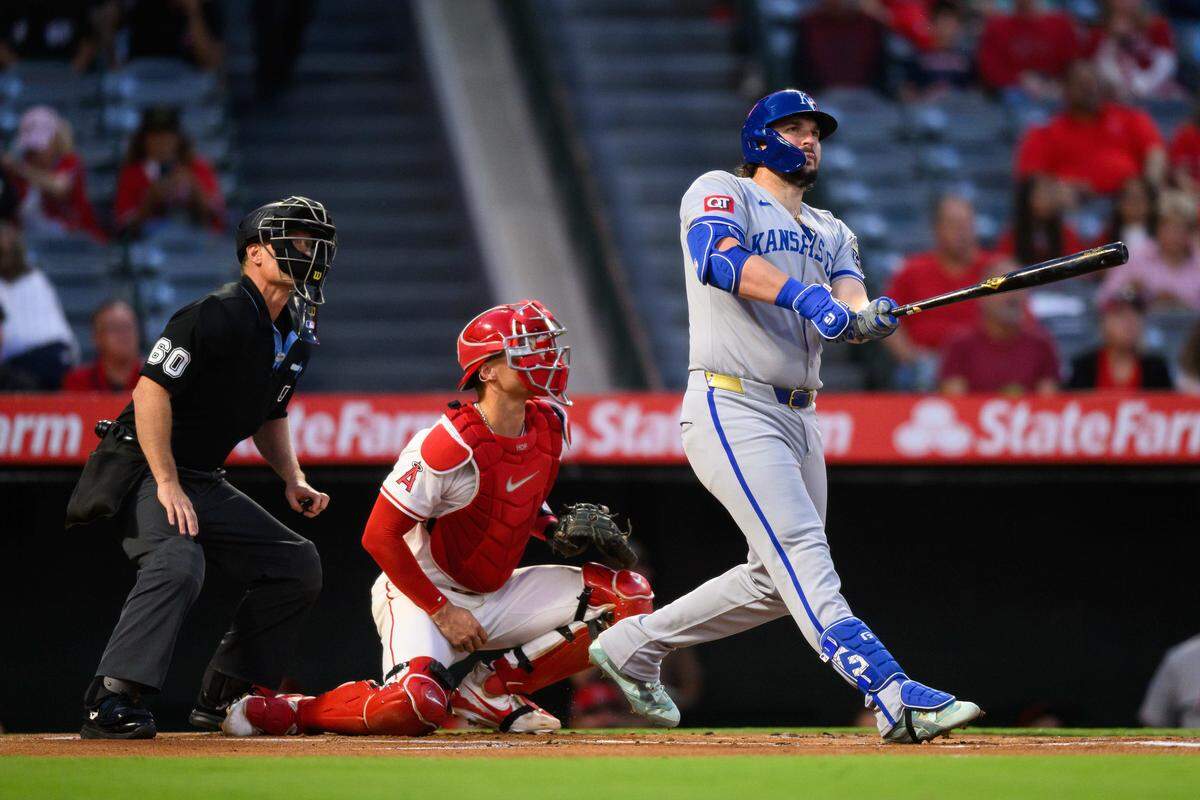Sep 25, 2025; Anaheim, California, USA; Kansas City Royals designated hitter Vinnie Pasquantino (9), right, hits a home run during the first inning against the Los Angeles Angels at Angel Stadium. Mandatory Credit: William Liang-Imagn Images