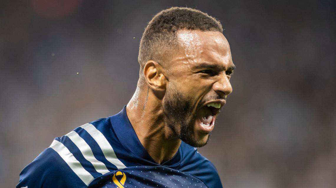 Sporting Kansas City forward Khiry Shelton shouts in celebration after scoring the opening goal against Minnesota Wednesday night at Children’s Mercy Park in Kansas City, Kan.