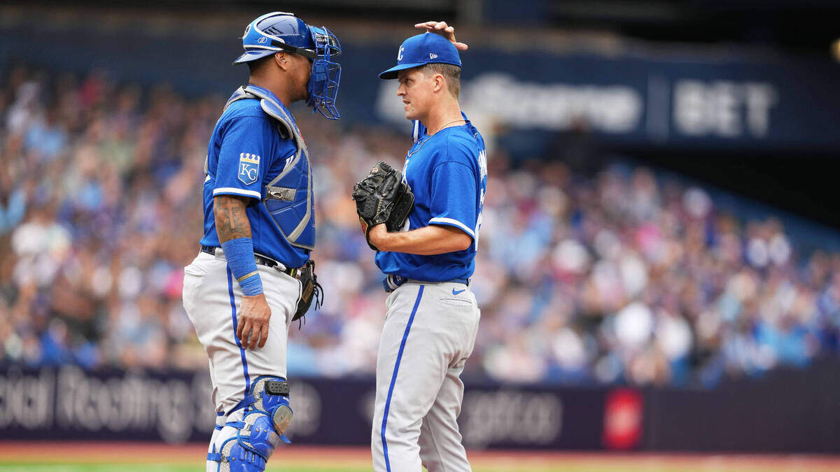 Kansas City Royals catcher Salvador Perez (13) talks with pitcher Zack Greinke (23) against the Toronto Blue Jays during the fourth inning at Rogers Centre on Sept. 9, 2023.