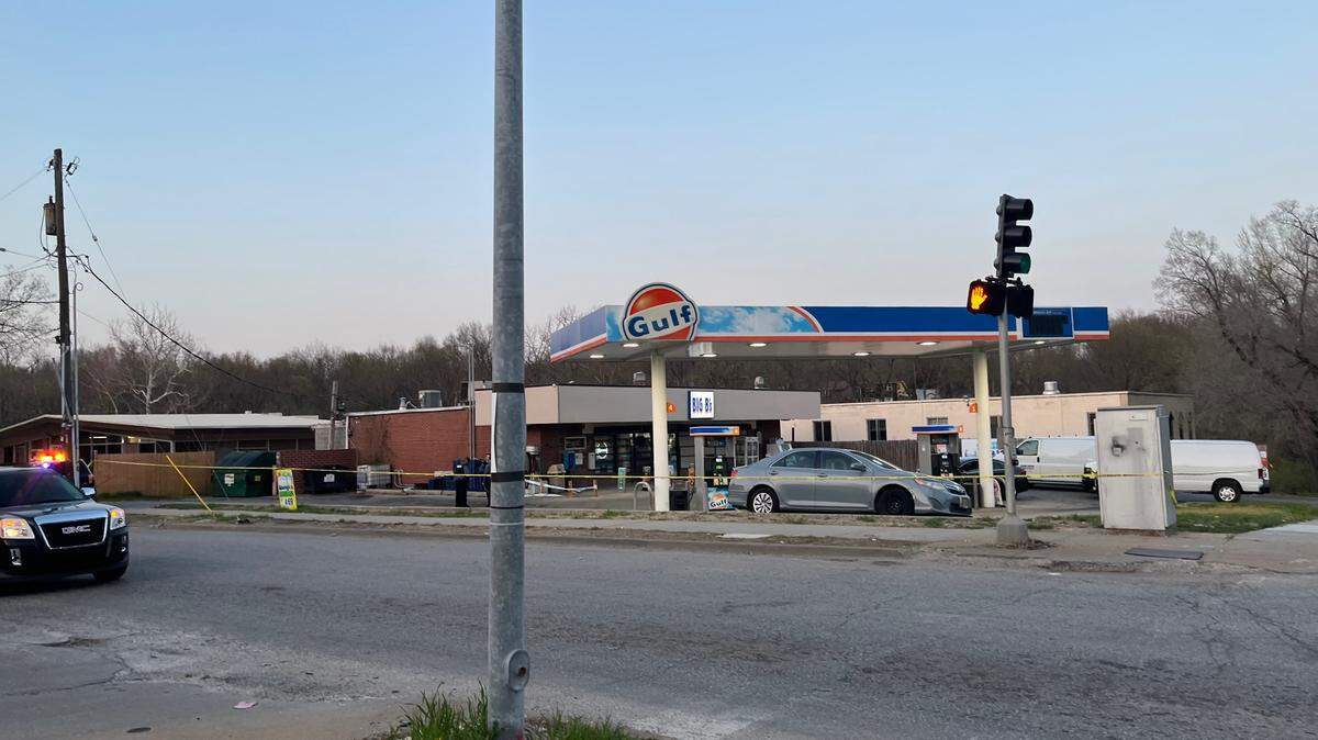 Police investigate the homicide of a Kansas City man outside a gas station on East Gregory Boulevard on Friday, April 15, 2022.