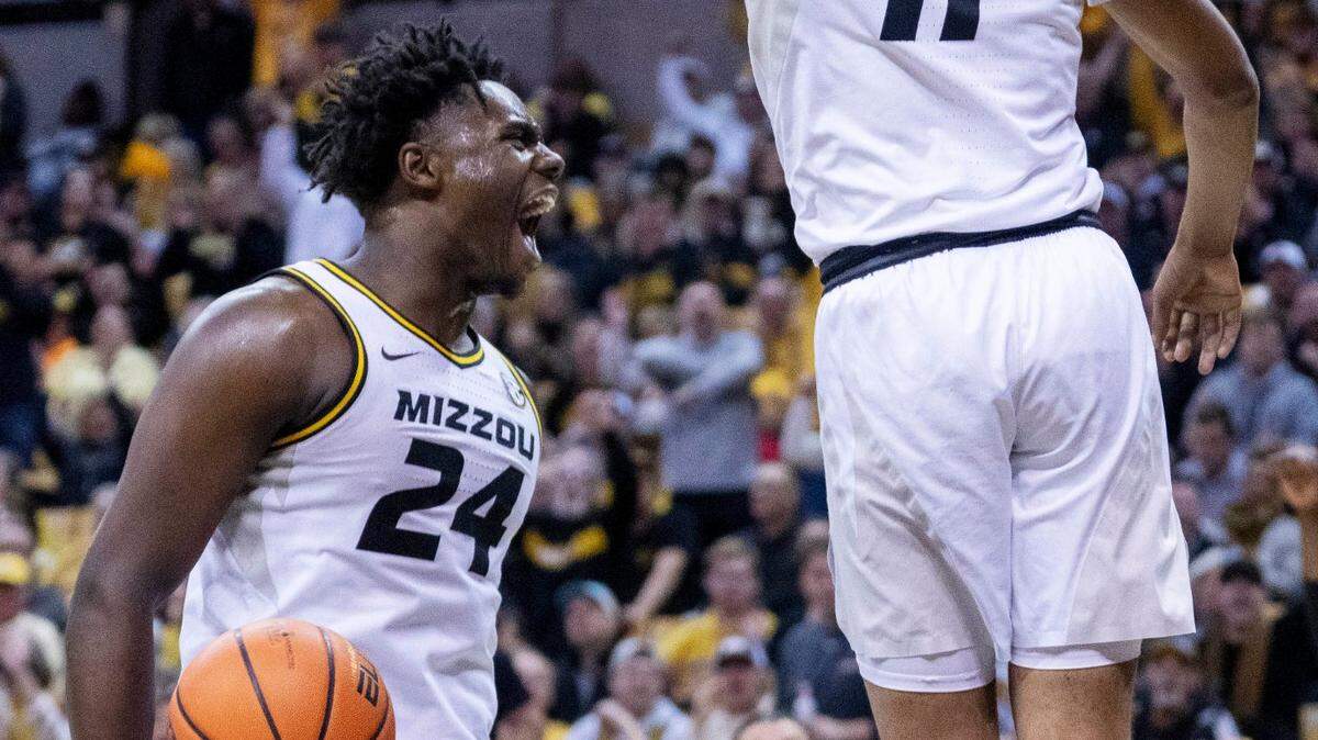 Missouri’s Kobe Brown celebrates a dunk by Isiaih Mosley during the second half of a game against LSU Wednesday, Feb. 1, 2023, in Columbia, Mo.
