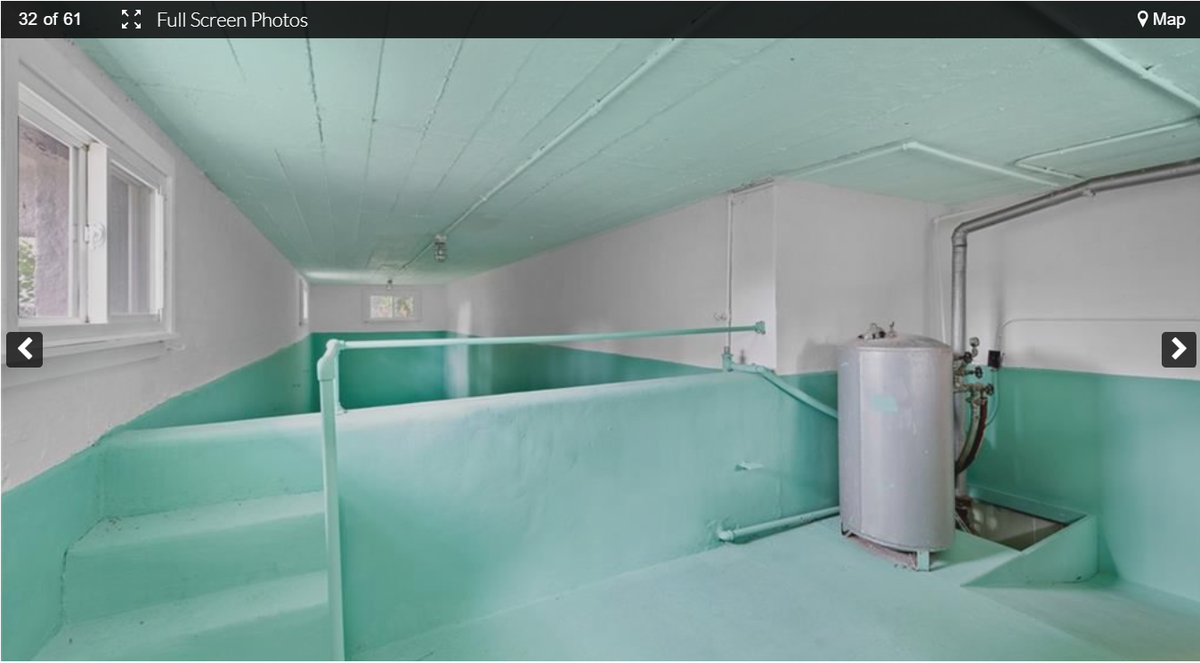 A pool underneath the front porch at 3232 Windsor Ave. This historic home near the Kansas City Museum in the Northeast includes an indoor pool and a ship’s wheel. Screenshot from the Kansas City Regional Association of Realtors website. Feb. 9, 2024.