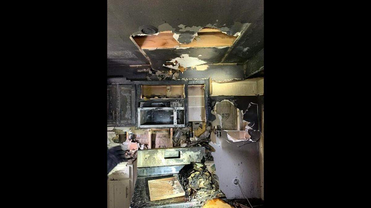 Gladstone firefighters rescued a dog from a burning duplex late Friday morning in the 6700 block of North Askew Avenue, according to the department.