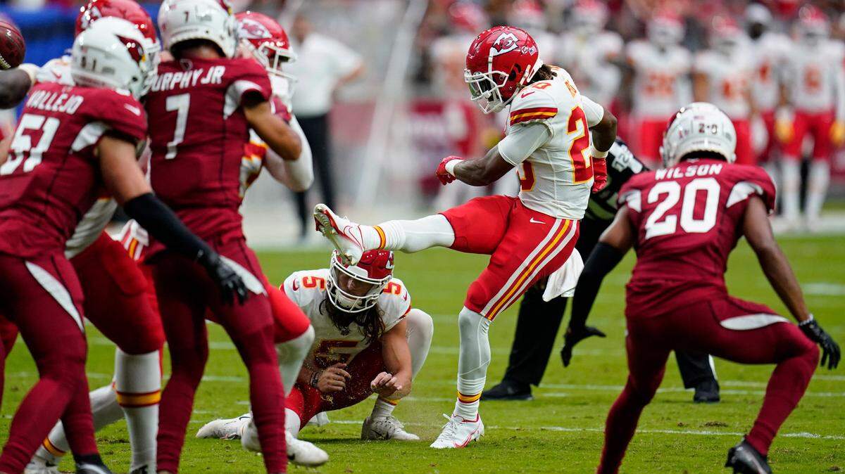Kansas City Chiefs safety Justin Reid (20) kicks an extra point against the Arizona Cardinals during the first half of an NFL football game, Sunday, Sept. 11, 2022, in Glendale, Ariz.