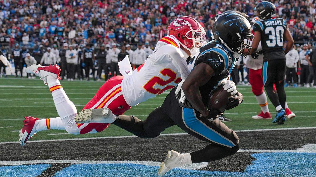 Carolina Panthers wide receiver David Moore (83) makes a touchdown catch against Kansas City Chiefs cornerback Trent McDuffie (22) during the second half at Bank of America Stadium.