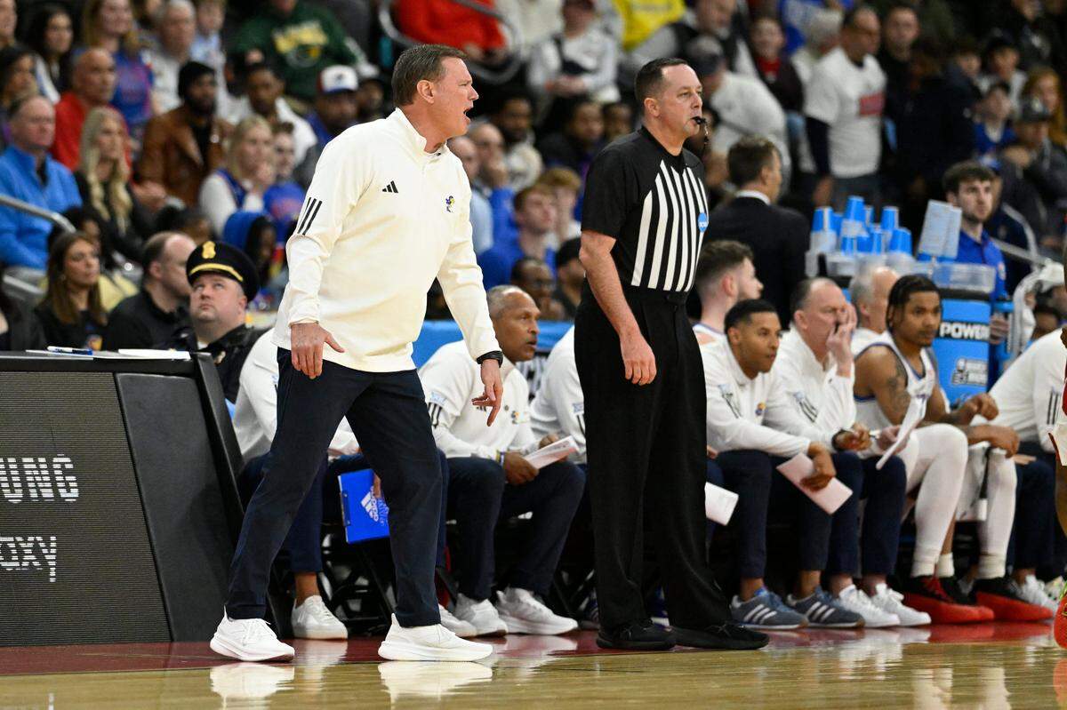 Kansas coach Bill Self yells out to his Jayhawks during a first-round NCAA Tournament men’s basketball game against the Arkansas Razorbacks at Amica Mutual Pavilion in Providence, Rhode Island, on Thursday, March 20, 2025.
