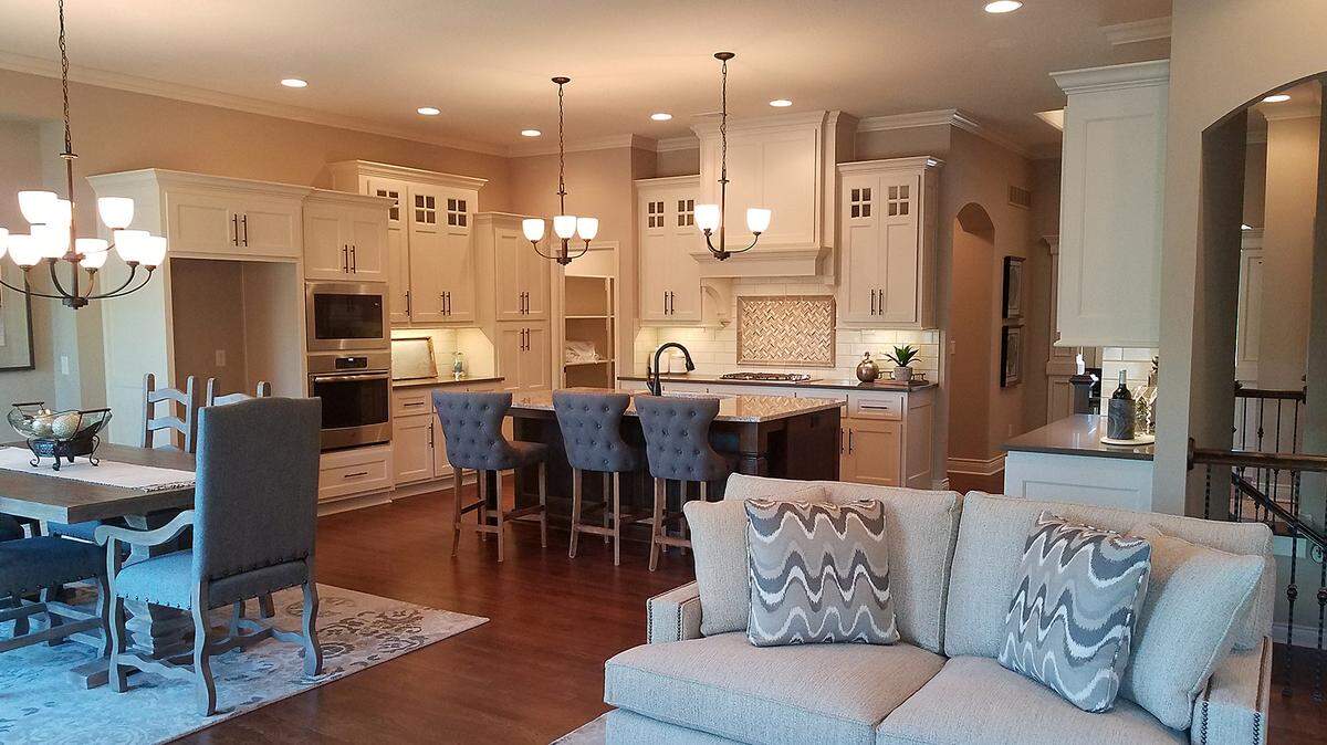 The living space flows into the well-appointed kitchen and dining areas for gracious living and entertaining in the Gatewood Villas Rockwood plan. 