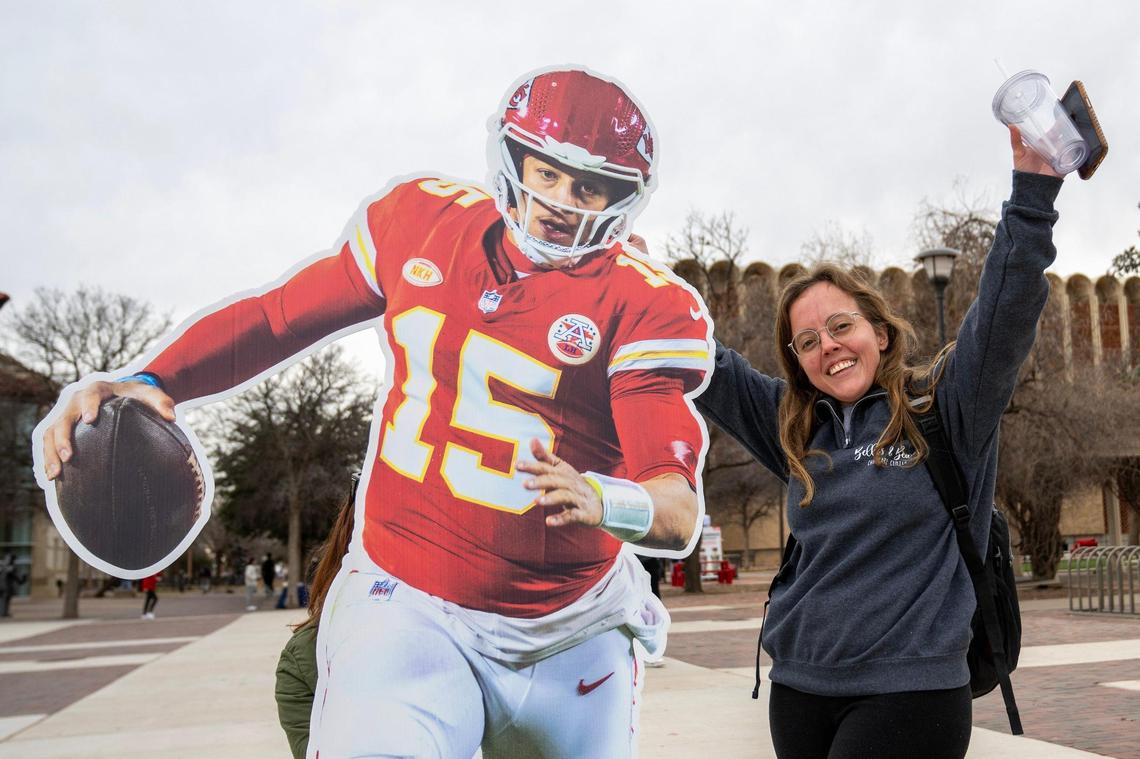 Haley Viney, a Texas Tech University student, poses for a photo next to a life-size cutout featuring Kansas City Chiefs quarterback Patrick Mahomes on Tuesday, Feb. 6, 2024, at Texas Tech University in Lubbock, Texas.