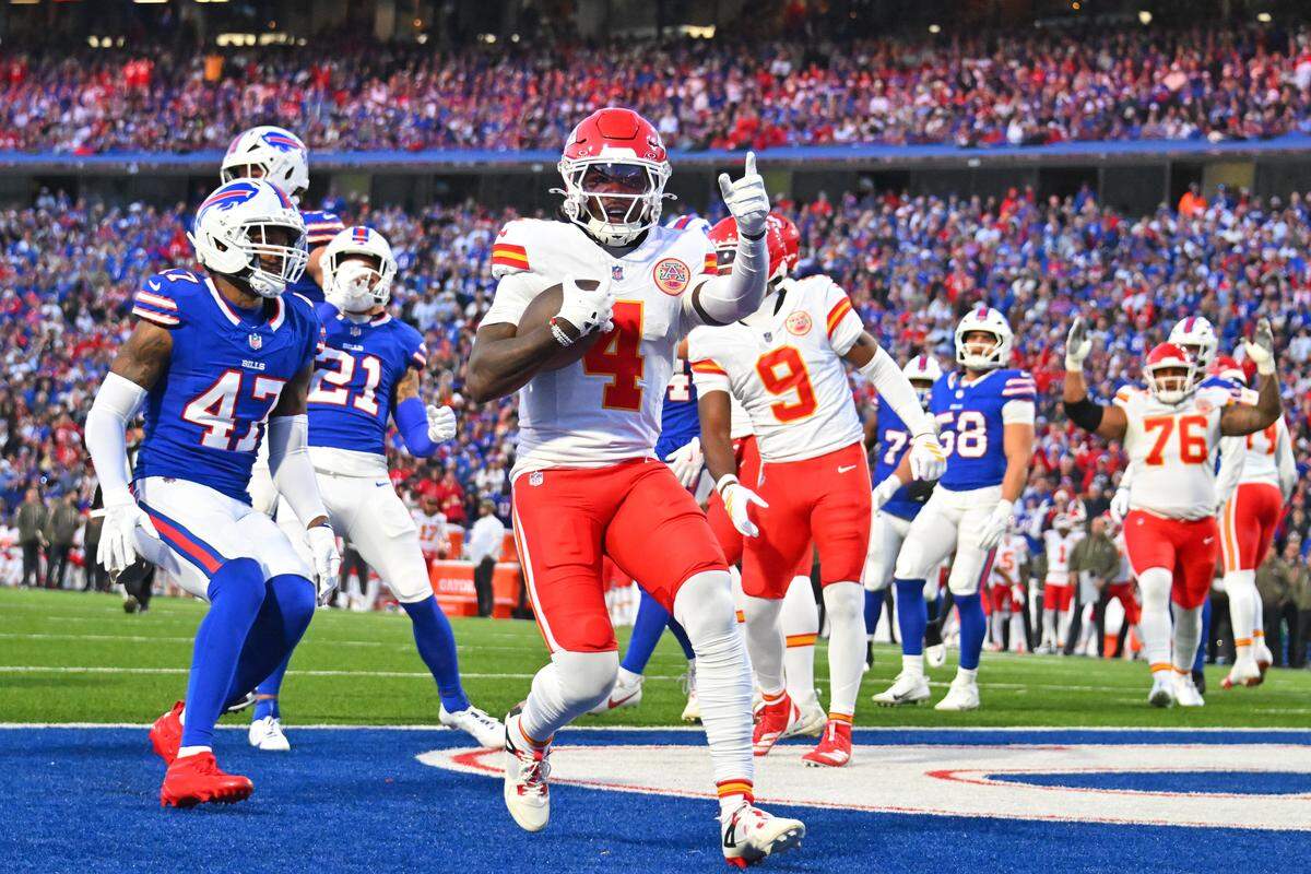 Kansas City Chiefs receiver Rashee Rice (No. 4) scores a touchdown against the Buffalo Bills during an NFL Week 9 game at Highmark Stadium in Orchard Park, New York, on Sunday, Nov. 2, 2025.