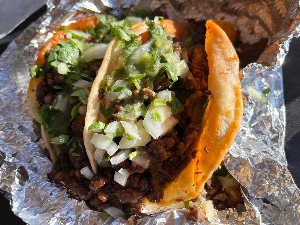 The carne asada tacos served at Tacos El Guero 100% Michoacanos in Kansas City, Kansas, are loaded with with meat.