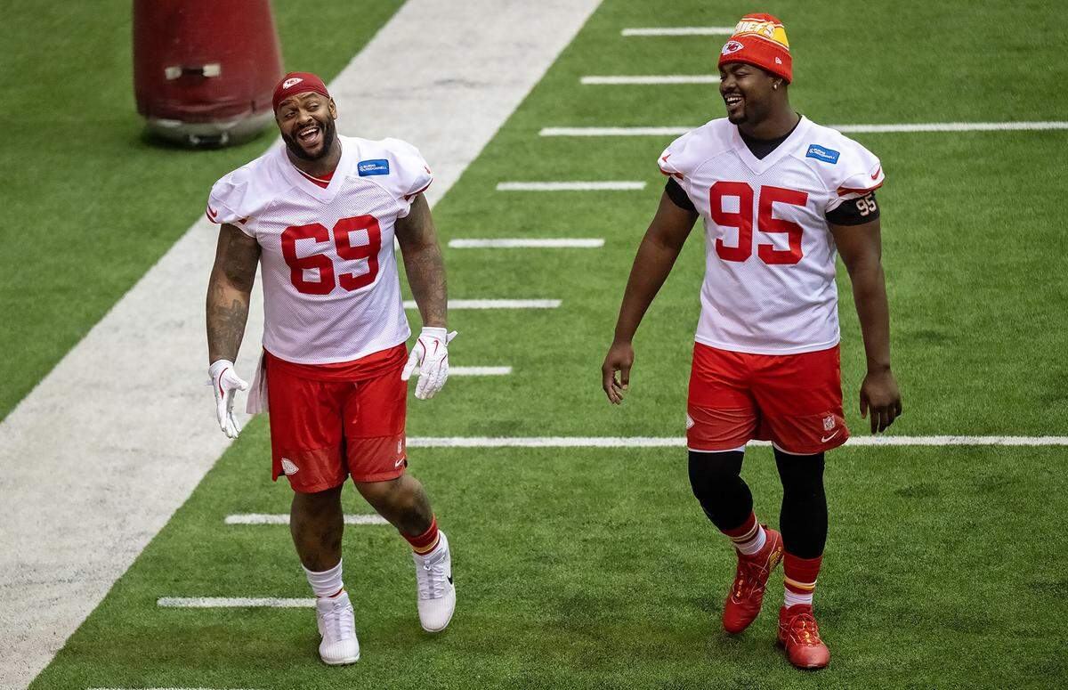 Kansas City Chiefs defensive lineman Mike Pennel (69) is back with the team and chatted with defensive end Chris Jones (95) during practice at the indoor training facility Wednesday, October 29, 2025, in Kansas City.