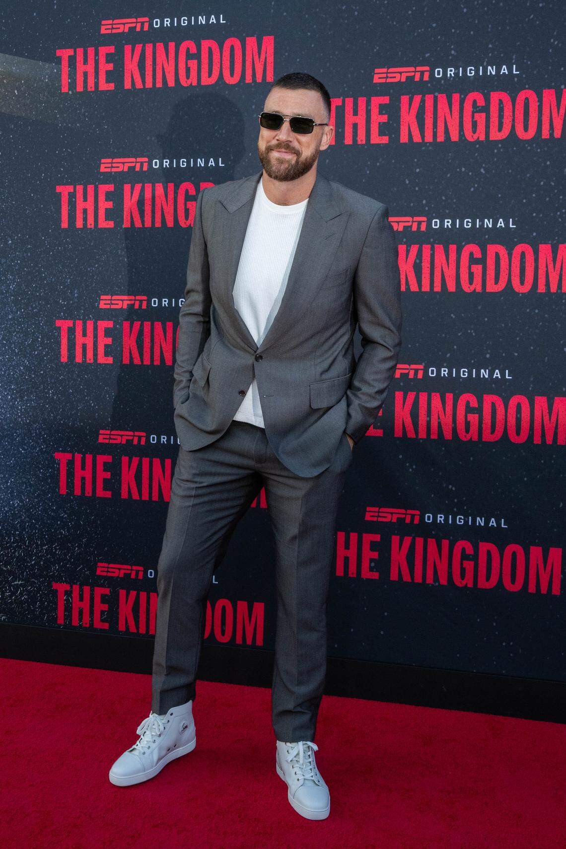 Travis Kelce on the red carpet before the special screening of the ESPN six-part series ‘The Kingdom,’ on Sunday. His fiancee, Taylor Swift, was at home.