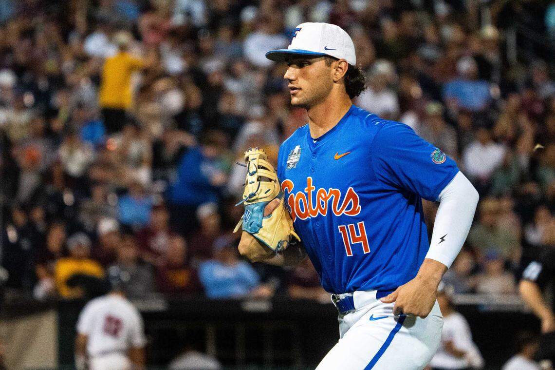 Florida Gators first baseman Jac Caglianone (14) runs off the field at the end of the seventh inning against the Texas A&M Aggies at Charles Schwab Field Omaha on Jun 15, 2024 in Omaha, NE, USA.