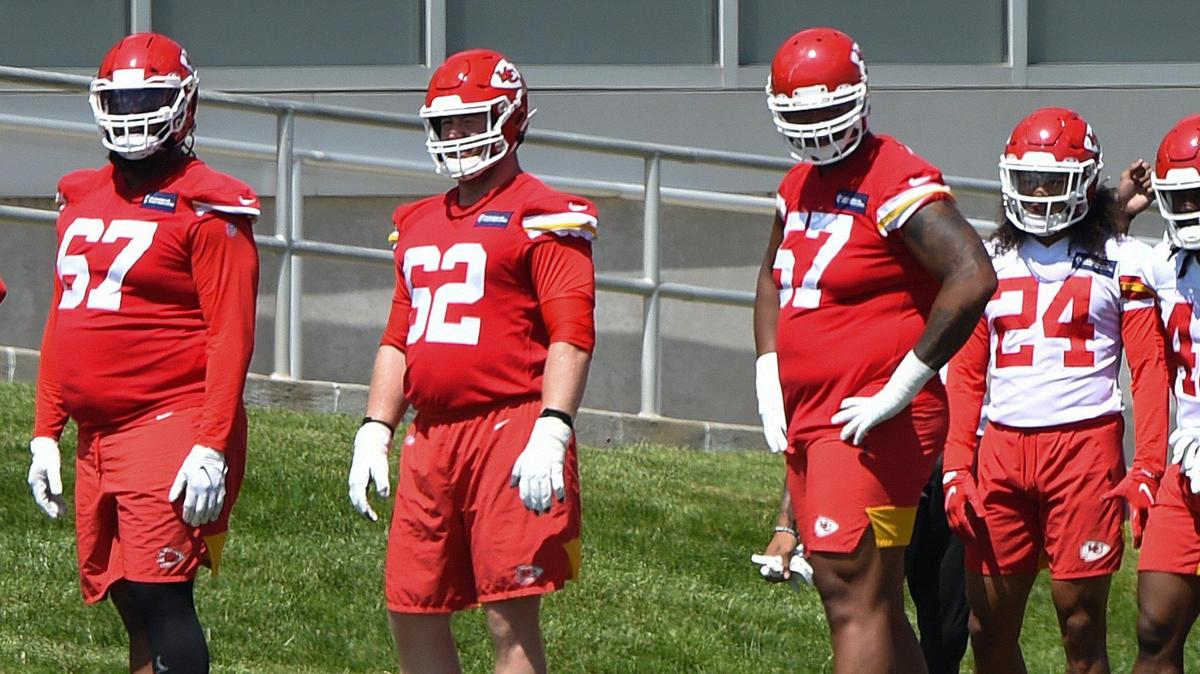 Chiefs’ offensive linemen Lucas Niang (67), Joe Thuney (62) and Orlando Brown (57) took the field during day 6 of the Chiefs OTAs at the team’s training facility on Thursday, June 3, in Kansas City.