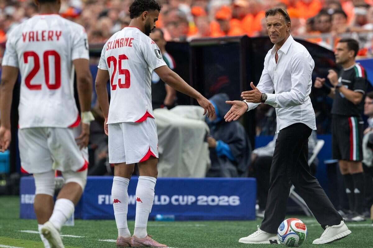 Tunisia team manager Hervé Renard claps for his team in a FIFA World Cup group-stage soccer match at Kansas City (Arrowhead) Stadium in Kansas City on Thursday, June 25, 2026.