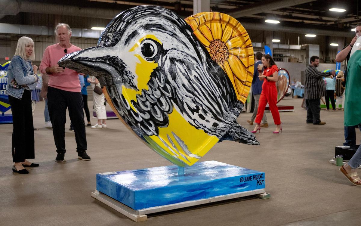 “Birds of a Feather Stick Together” by artist Julie Heide is one of 40 hearts that make up the 2023 season of The Parade of Hearts.