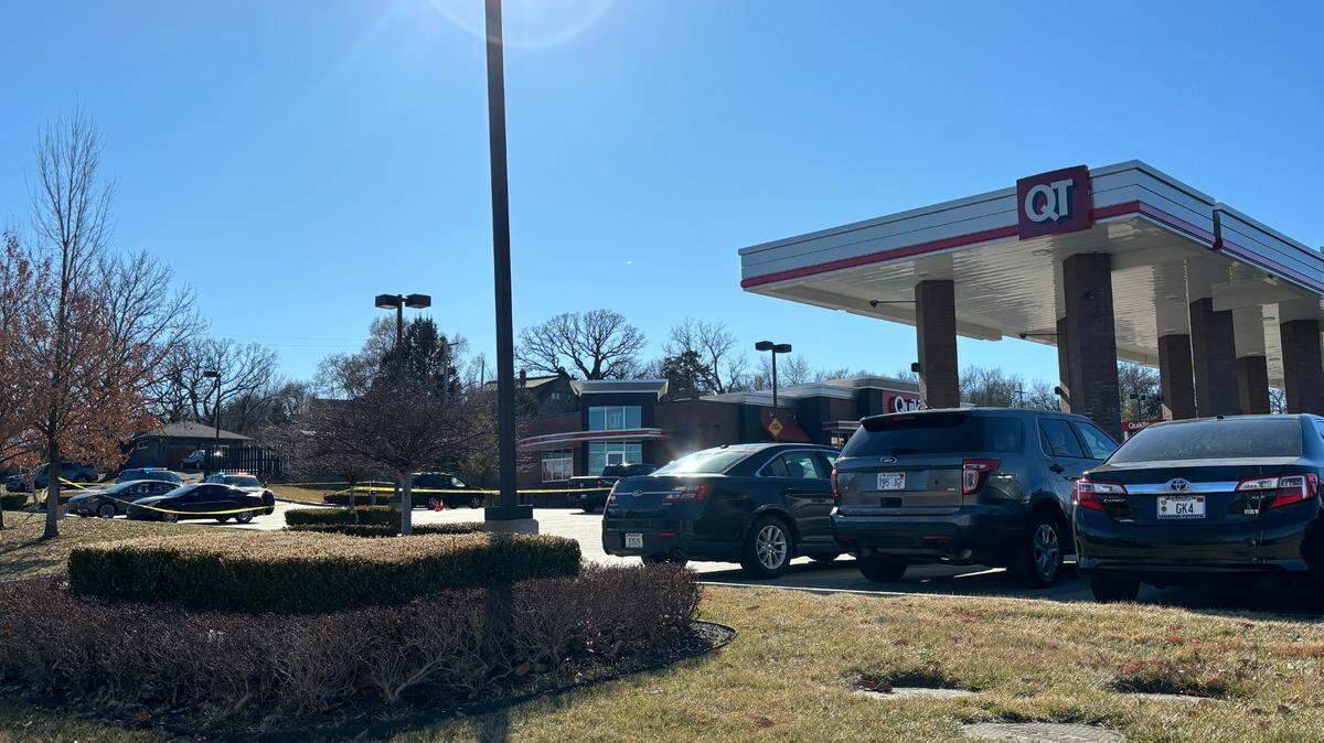Officials continue to investigate the scene where an officer shot an armed suspect, who was taken to the hospital in critical condition on Feb. 18. 2024.