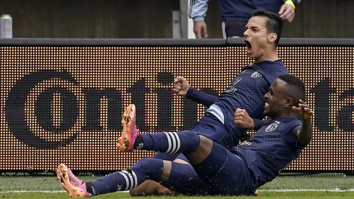 Sporting Kansas City forward Daniel Salloi, top, has signed a contract extension that will keep him in KC through the 2026 season.
